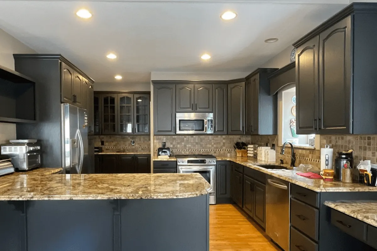 Kitchen cabinets painted in Sherwin Williams Iron Ore SW 7069